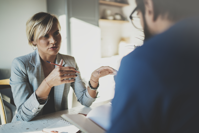 Two people in discussion